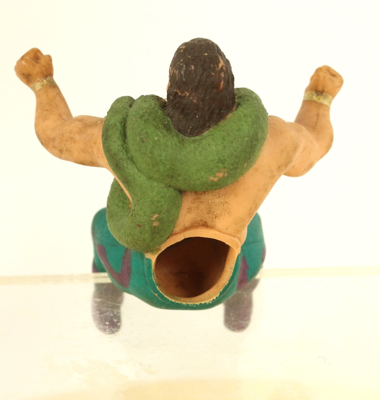 Vintage WWF Jake “The Snake” Roberts Thumb Action Figure – Classic Wrestling Collectible