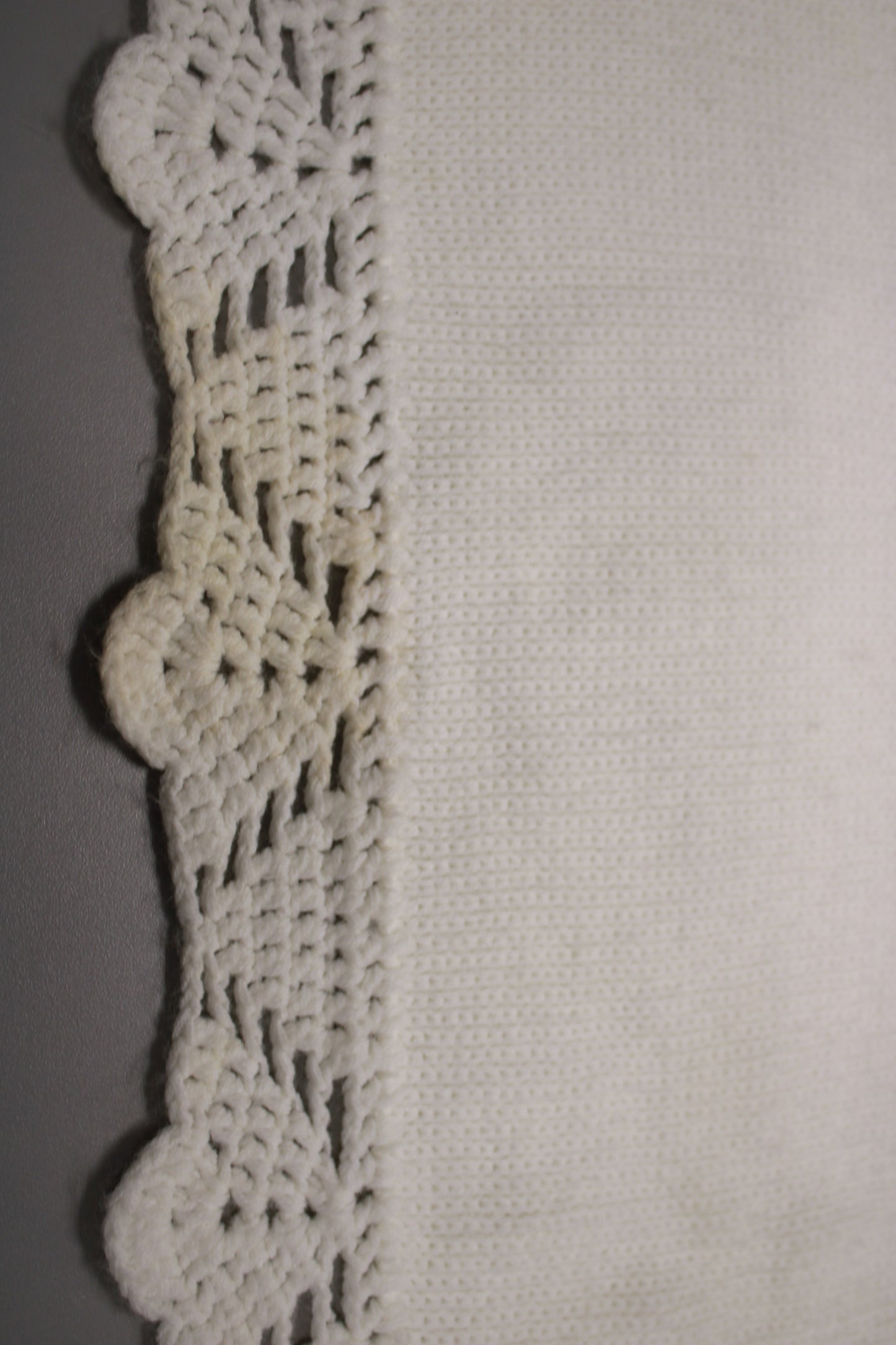 Hand-Knitted White Baby Blanket with Blue Floral Embroidery