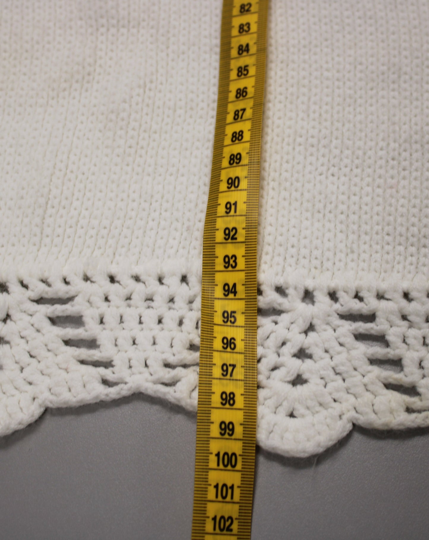 Hand-Knitted White Baby Blanket with Blue Floral Embroidery