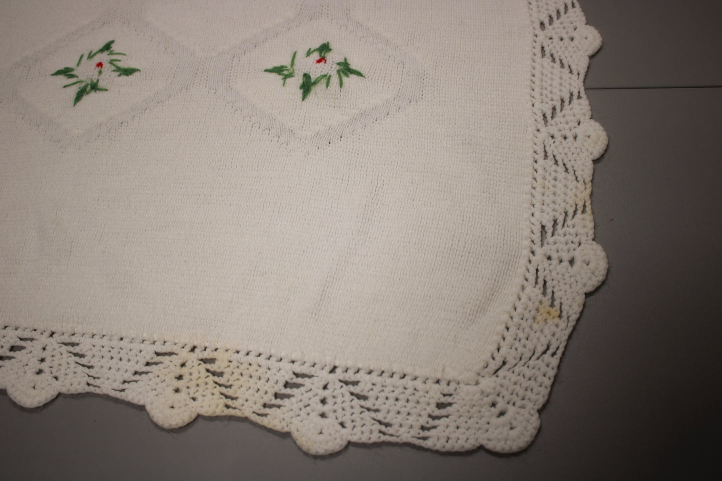 Hand-Knitted White Baby Blanket with Blue Floral Embroidery