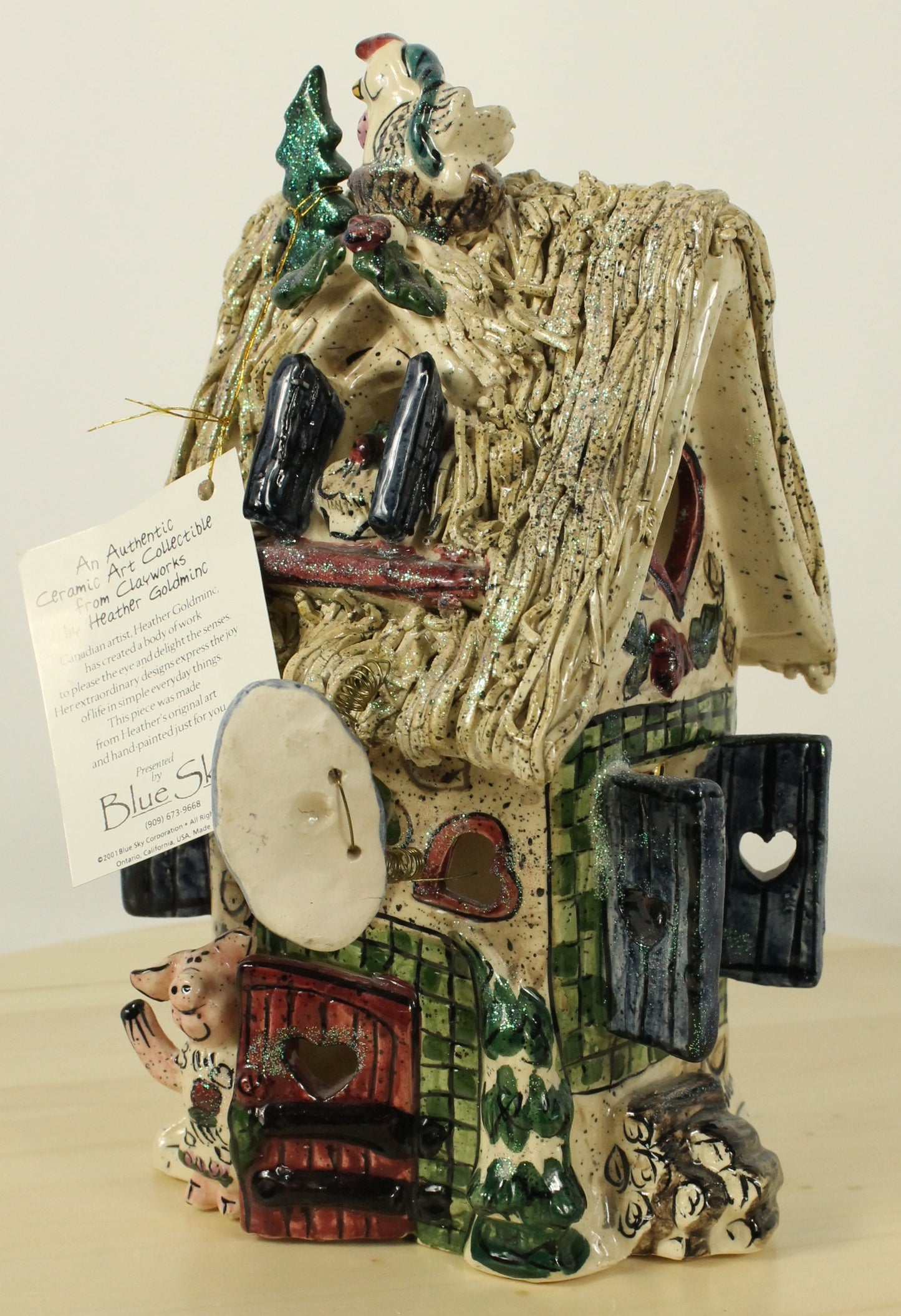 Blue Sky Clayworks by Heather Goldminc Ceramic Santa & Thatched Roof House Decorations