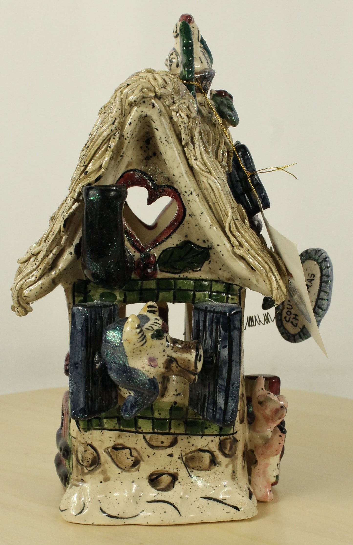 Blue Sky Clayworks by Heather Goldminc Ceramic Santa & Thatched Roof House Decorations