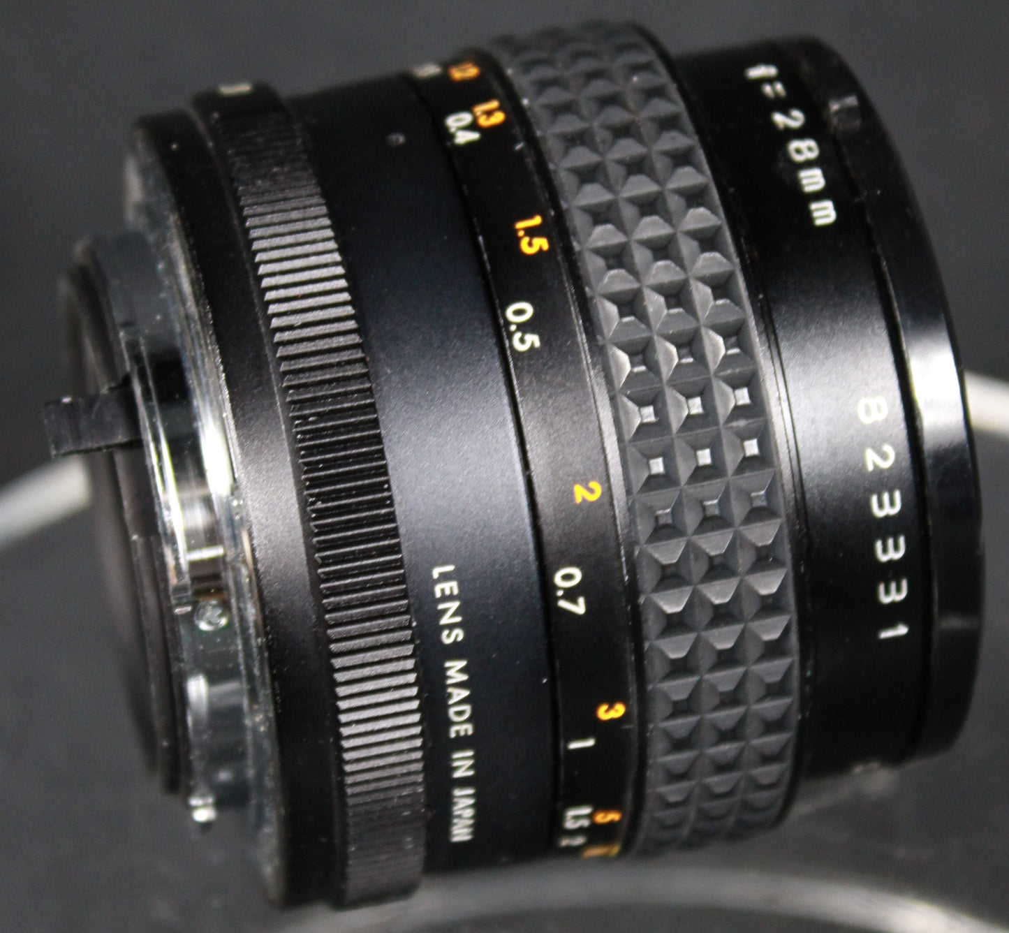Makinnon Multi-Coated 28mm f/2.8 Wide-Angle Lens with 55mm Front Cap