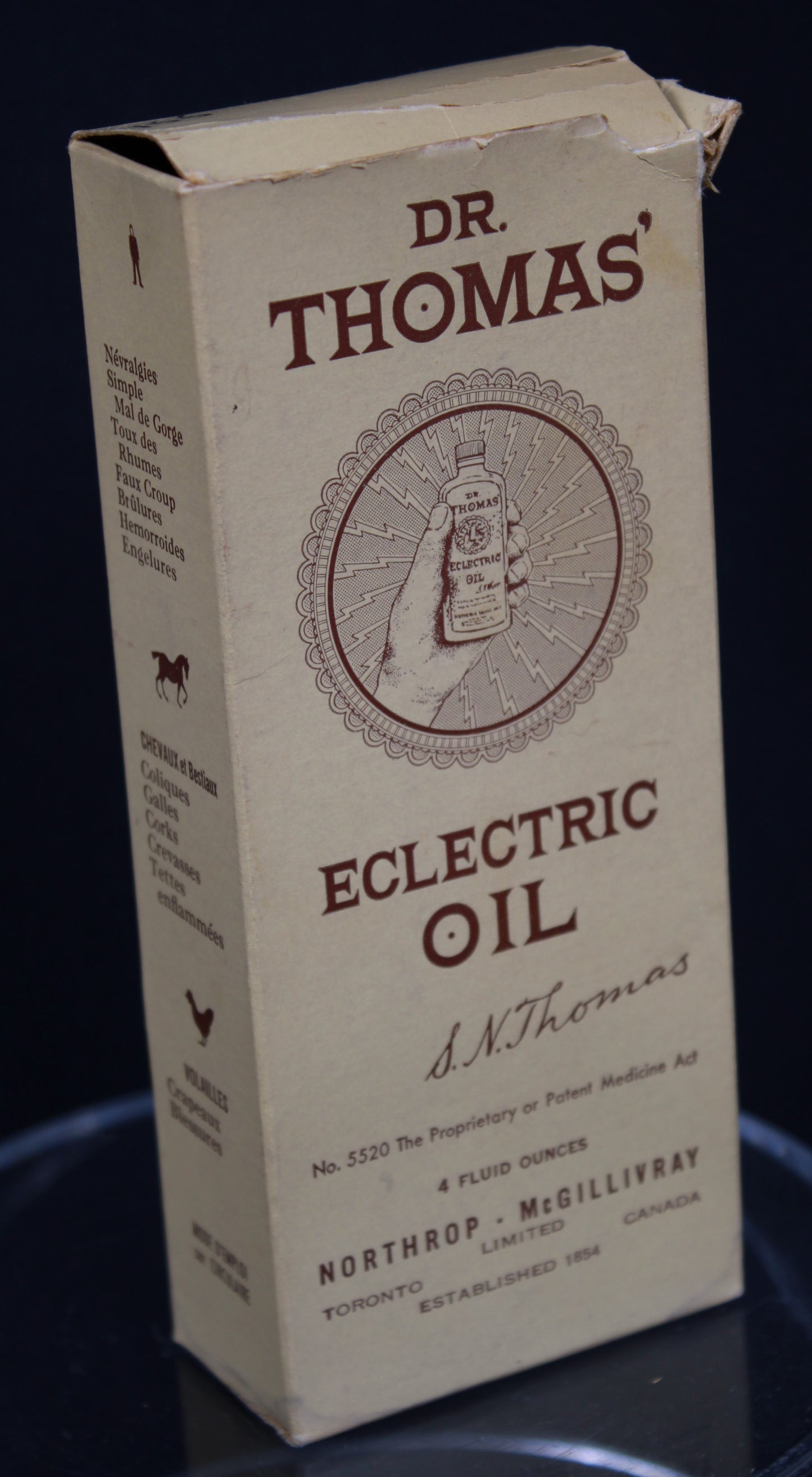 Vintage Dr. Thomas' Eclectric Oil Bottle with Original Bilingual Box