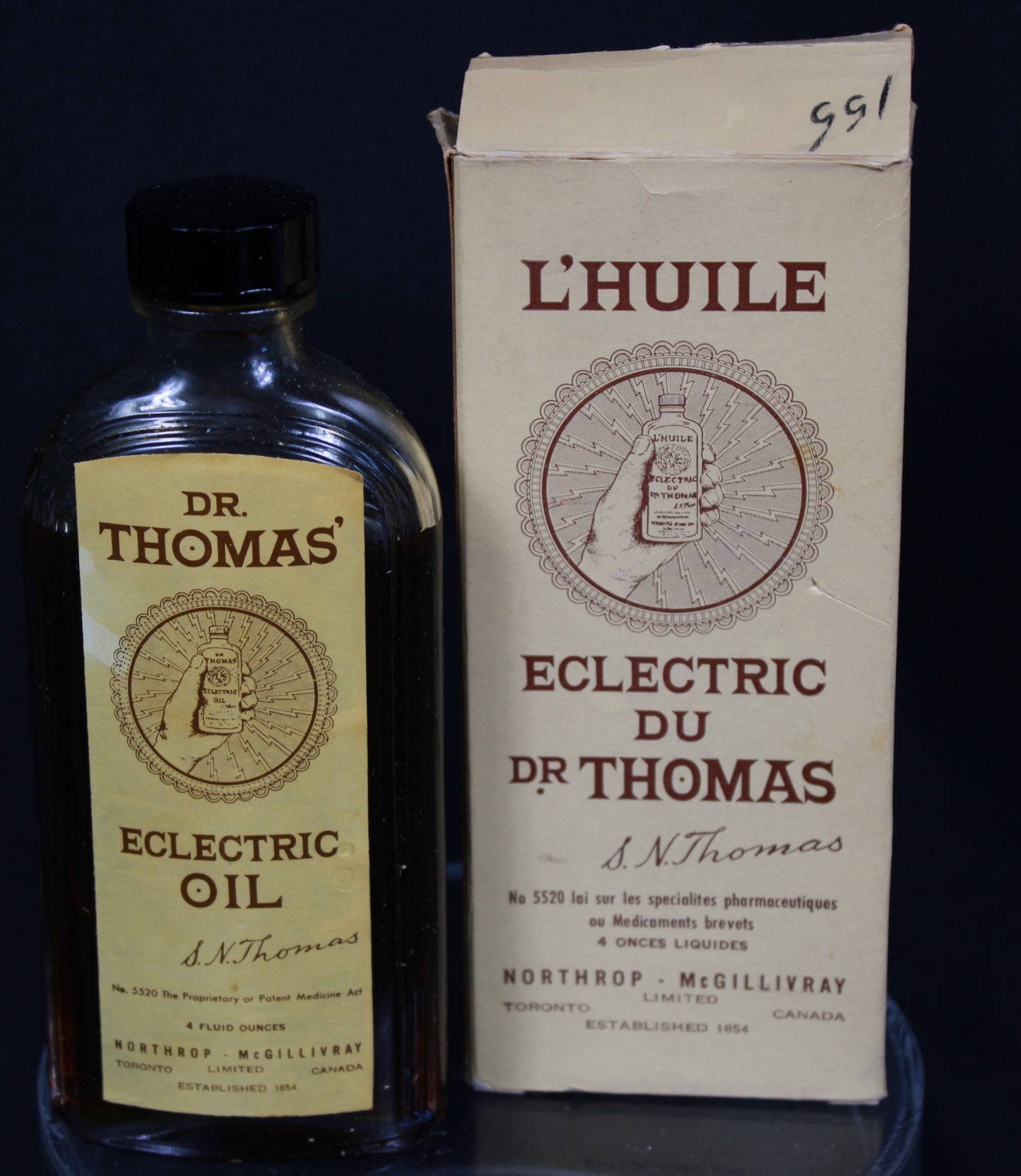 Vintage Dr. Thomas' Eclectric Oil Bottle with Original Bilingual Box