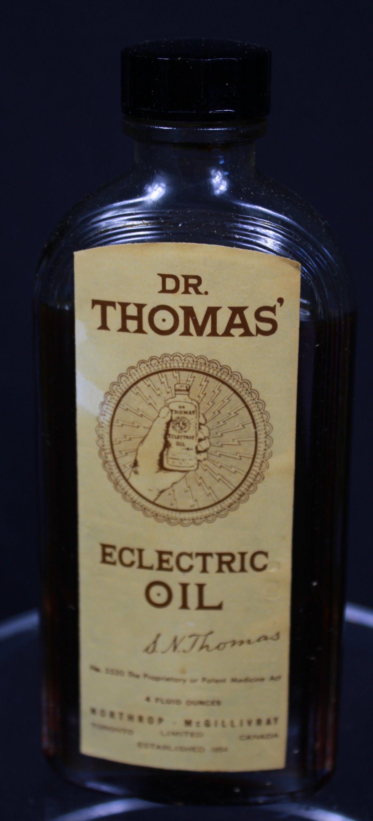 Vintage Dr. Thomas' Eclectric Oil Bottle with Original Bilingual Box