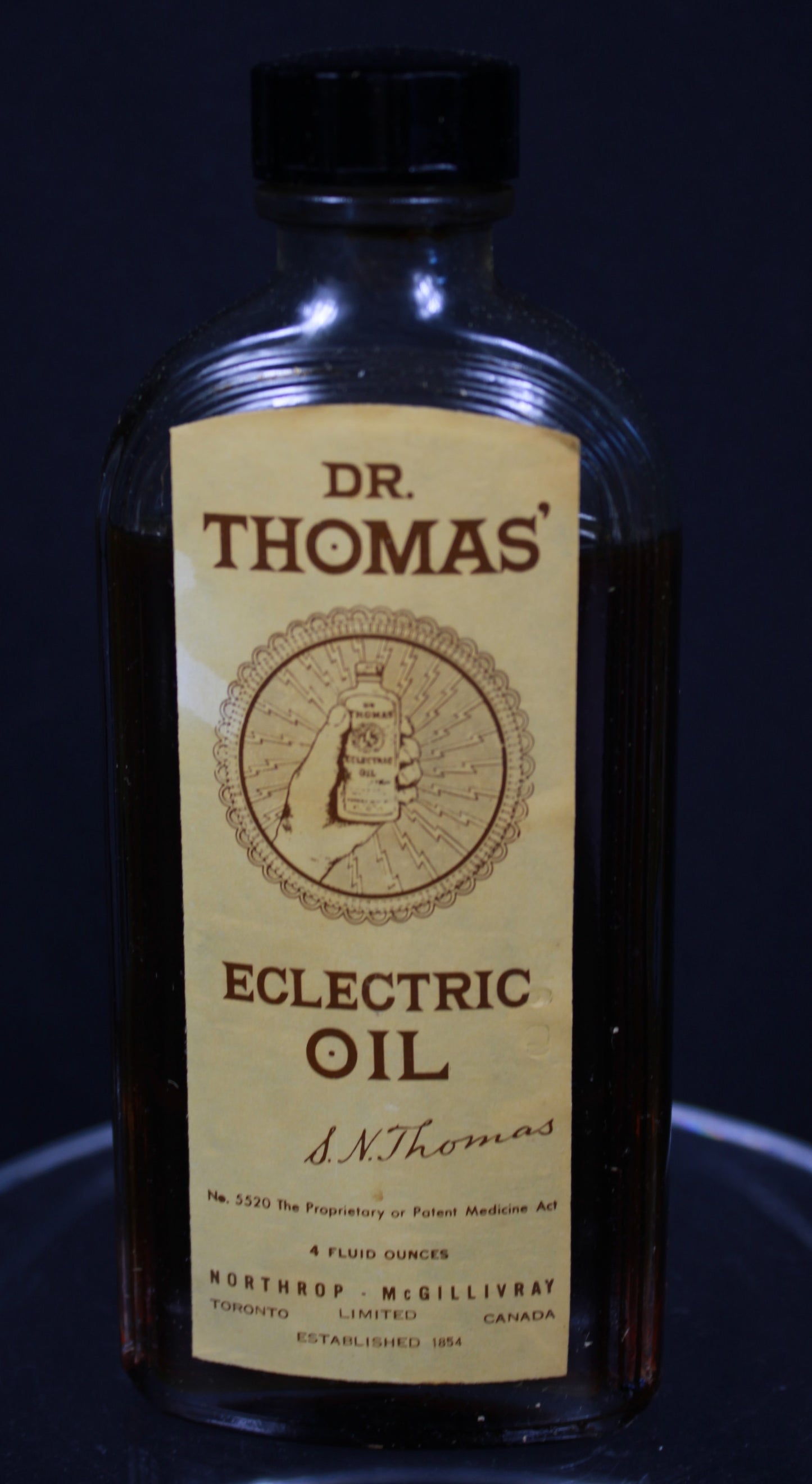 Vintage Dr. Thomas' Eclectric Oil Bottle with Original Bilingual Box