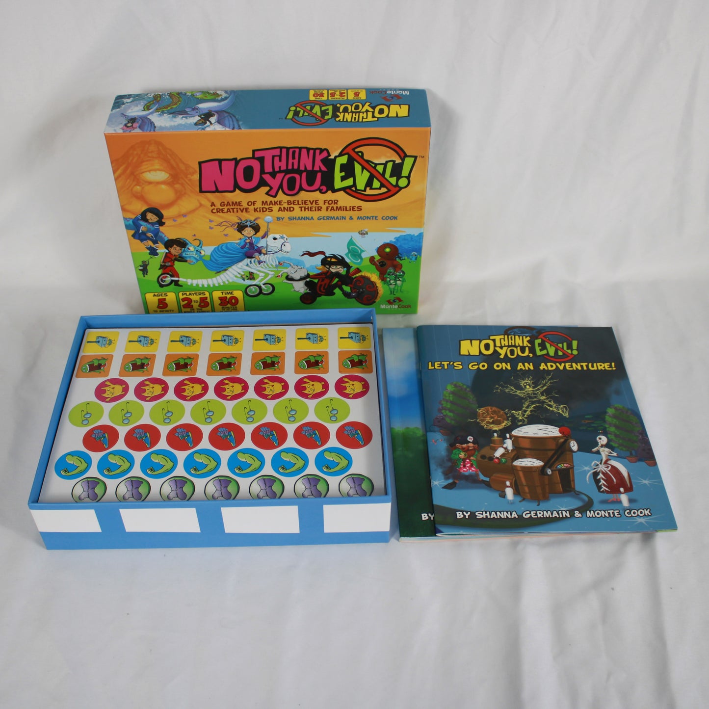 Board game 'No Think You Evil!' with components on a white background