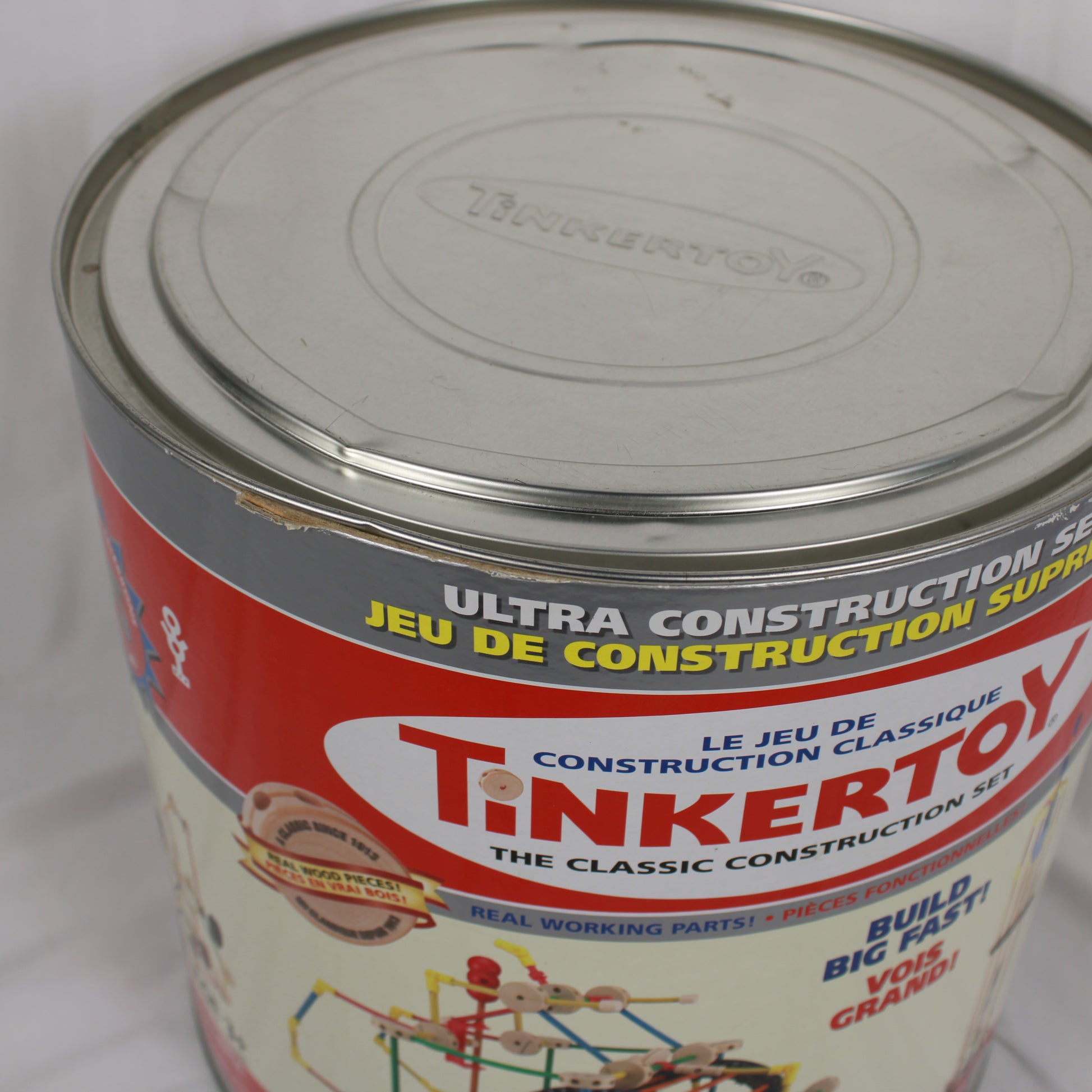 Tinkertoy construction set can with label on a white background