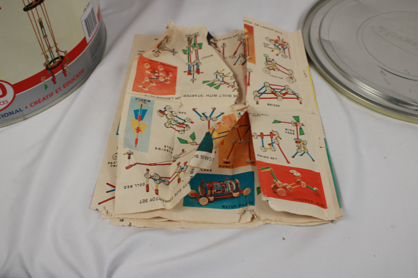 Vintage toy catalog with colorful illustrations on a white surface