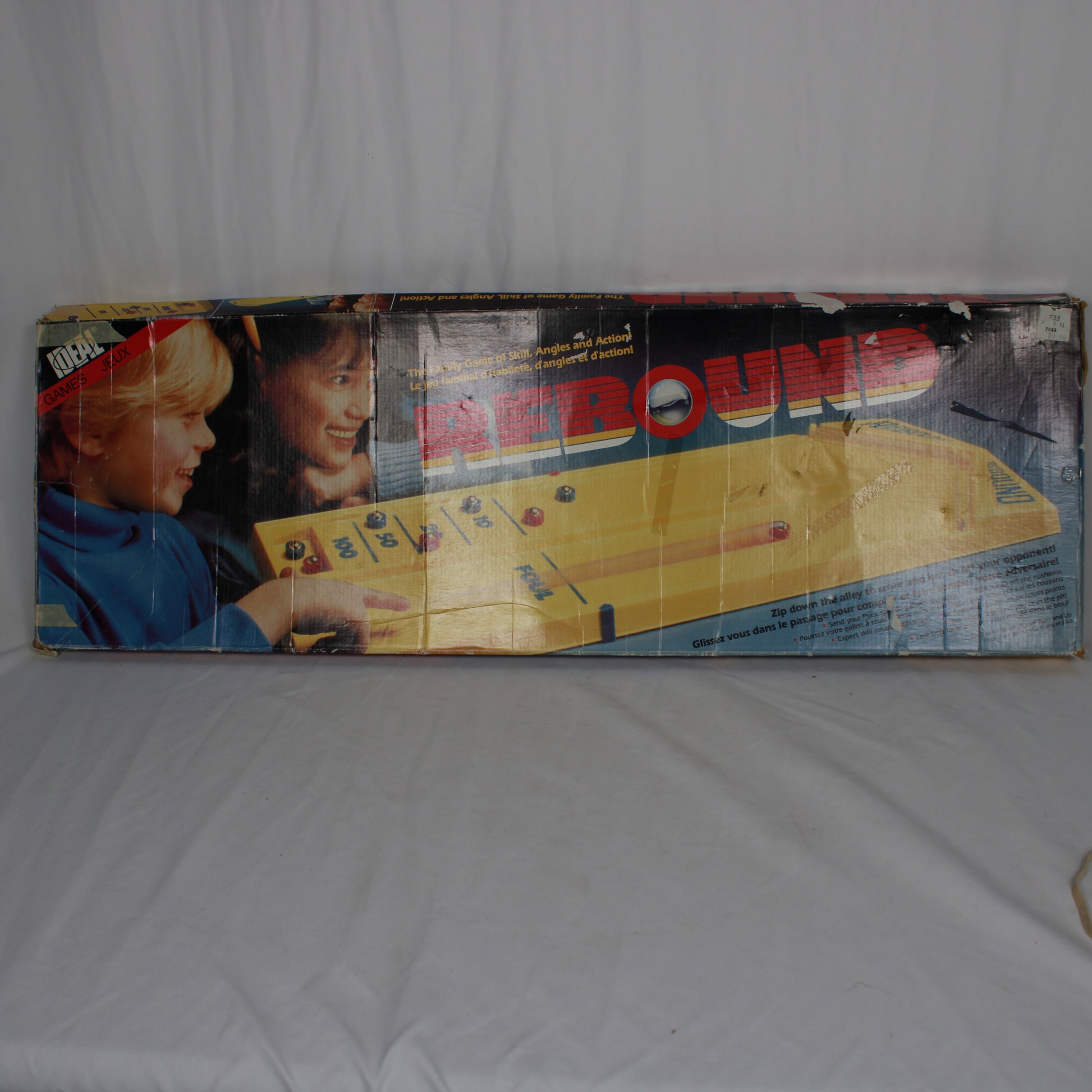 Vintage 'Rebound' game box with children playing on a plain background