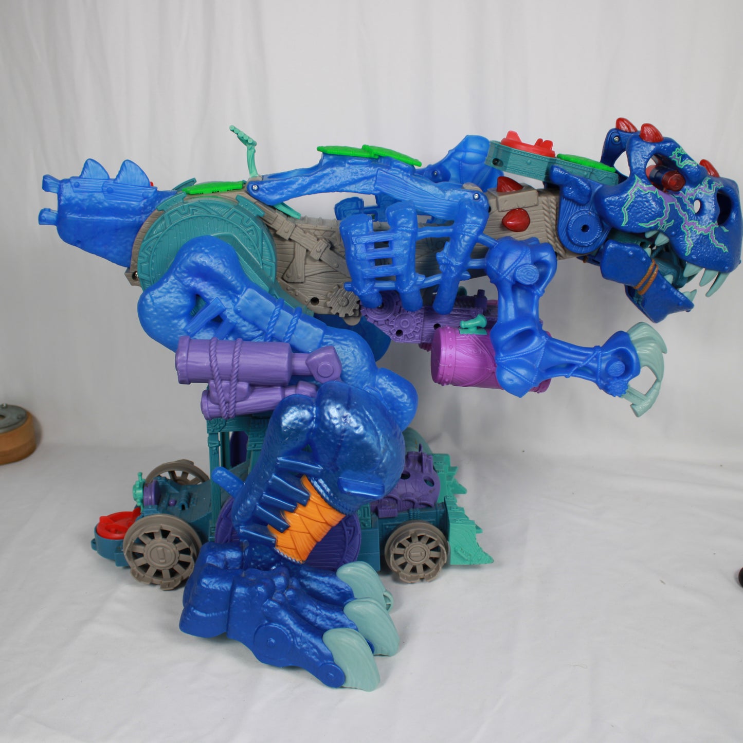 Toy robot with blue and purple colors on a white background