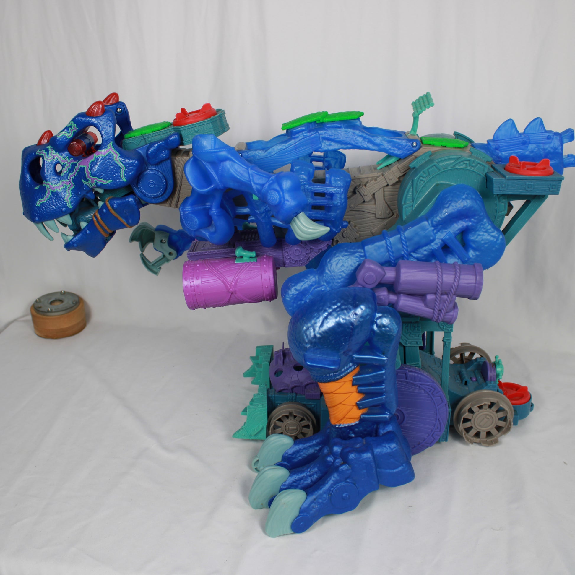 Toy robot with blue and purple colors on a white background