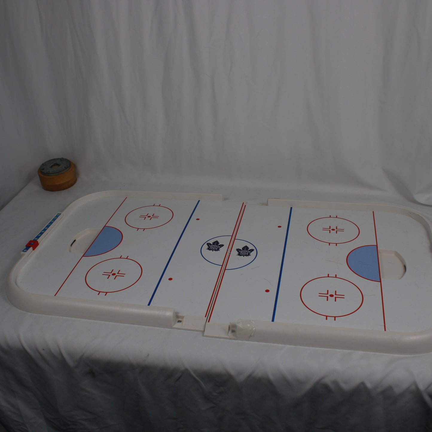 Air hockey table with a white background