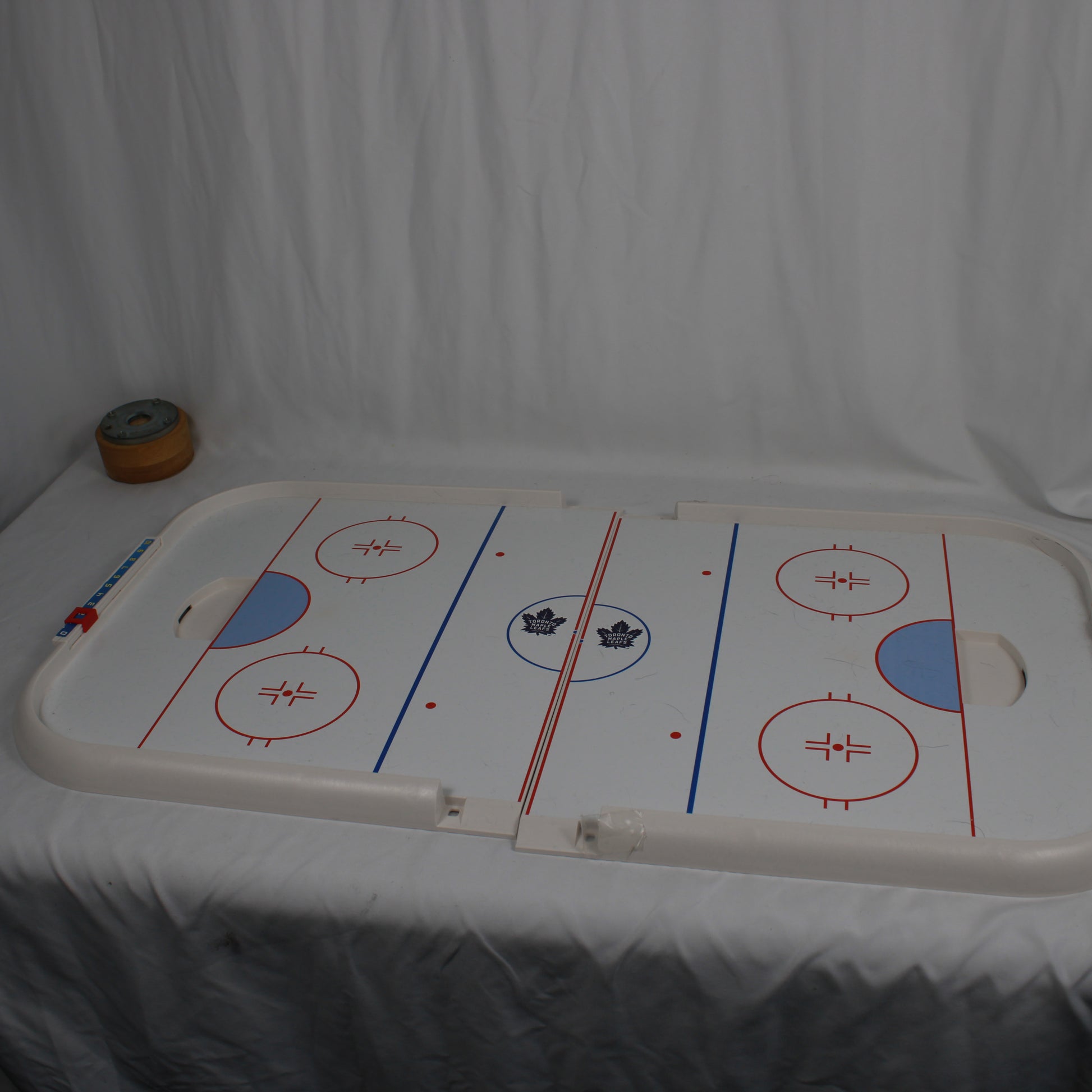 Air hockey table with a white background