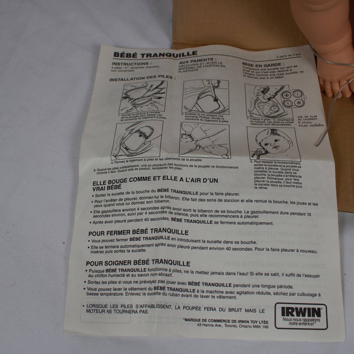 Instructions sheet for a baby toy with illustrations and text on a white background