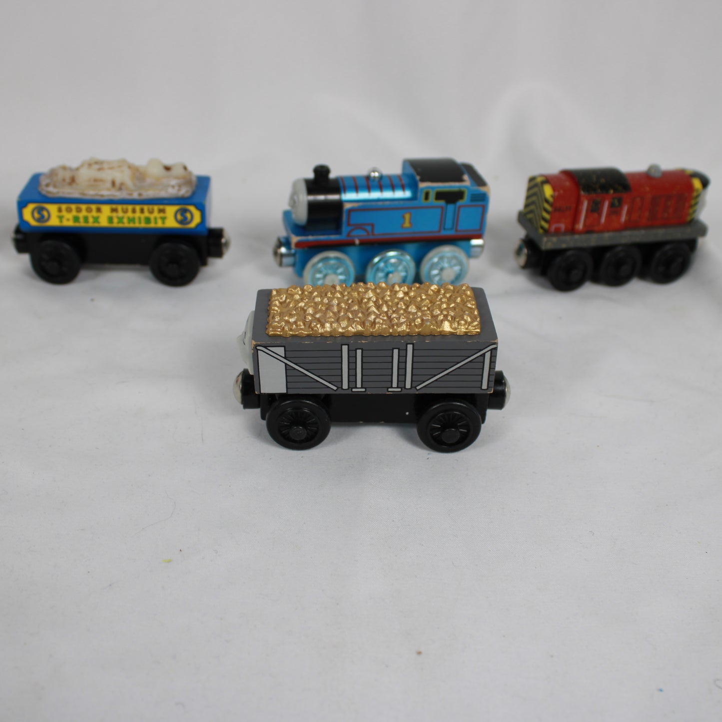 Set of toy trains on a white background