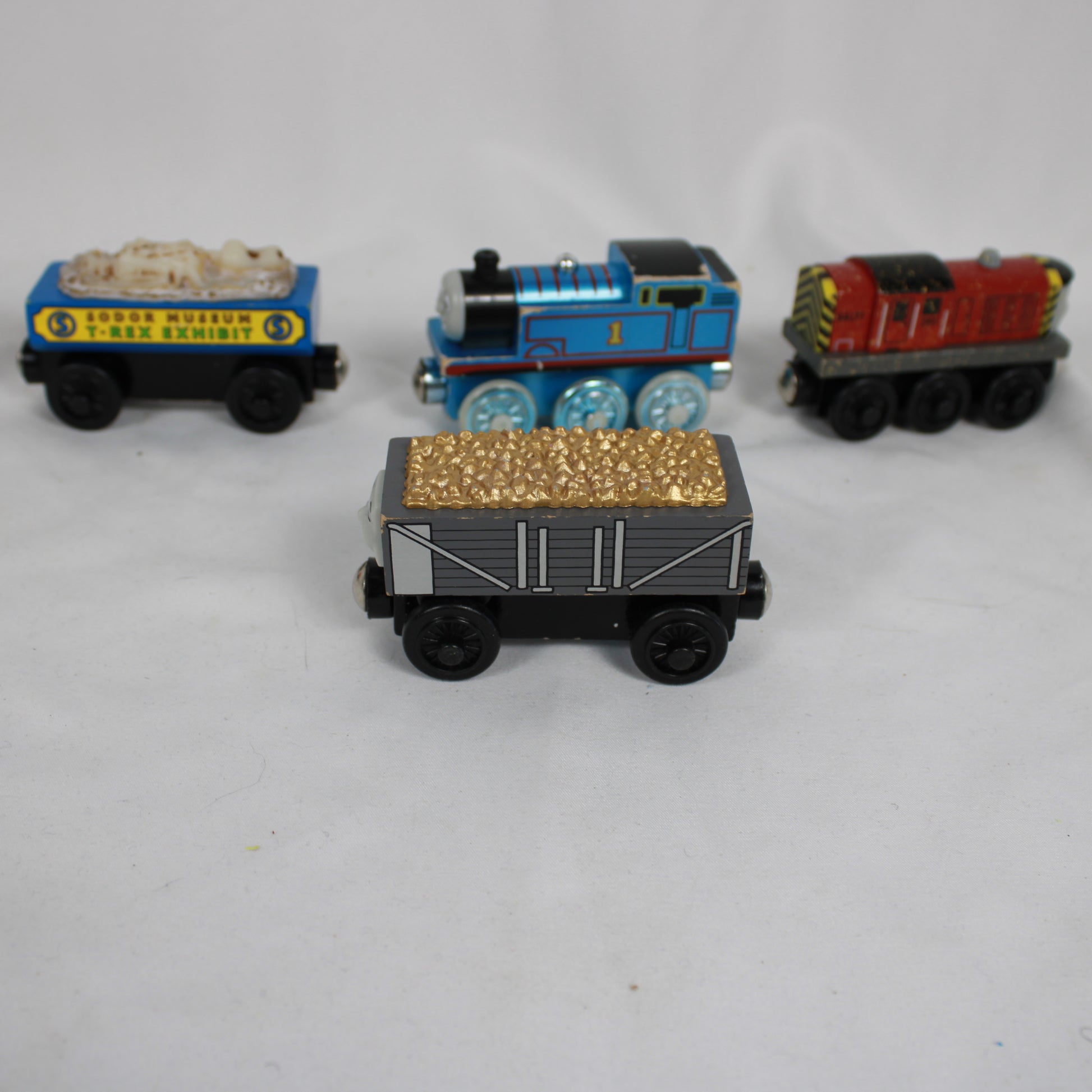 Set of toy trains on a white background