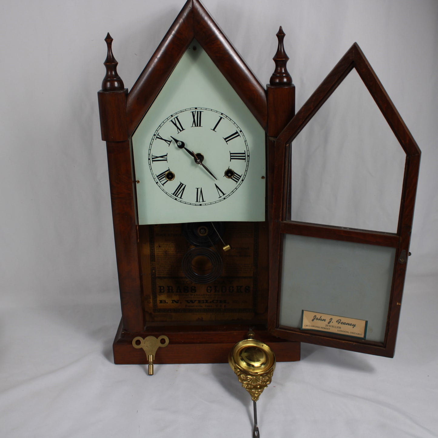 E. N. Welch Gothic Steeple Mantle Clock Floral Reverse Glass Door