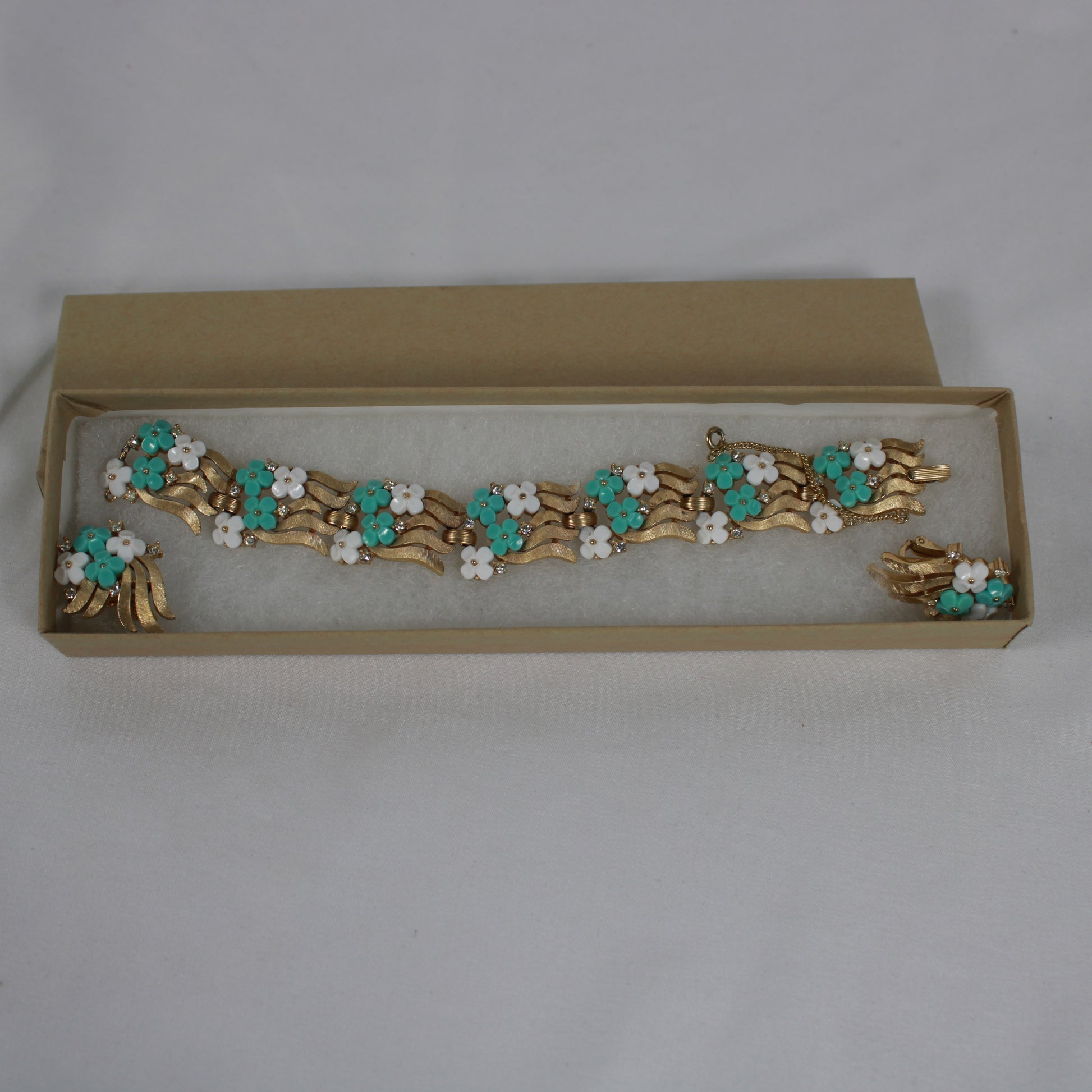 Crown Trifari Floral Demi-Parure: Gold-Tone Bracelet & Clip Earring Set