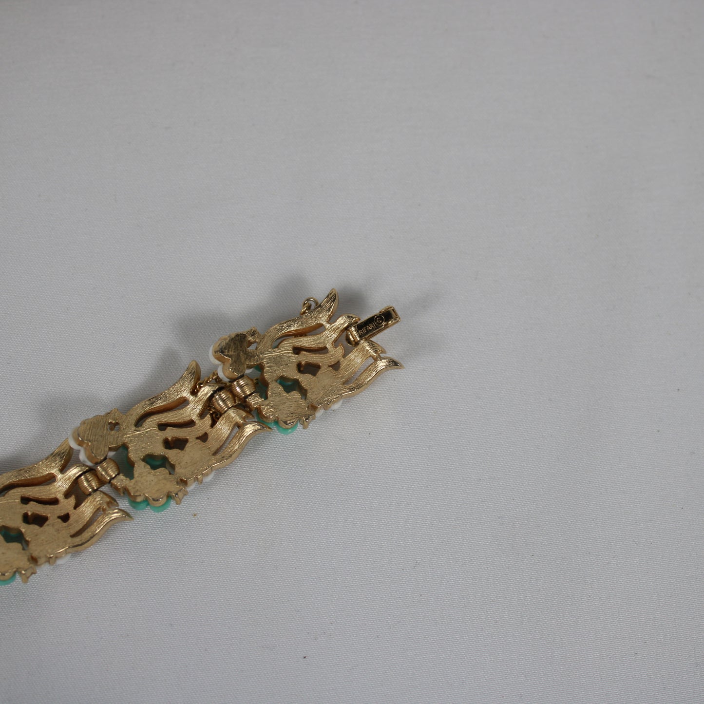Crown Trifari Floral Demi-Parure: Gold-Tone Bracelet & Clip Earring Set
