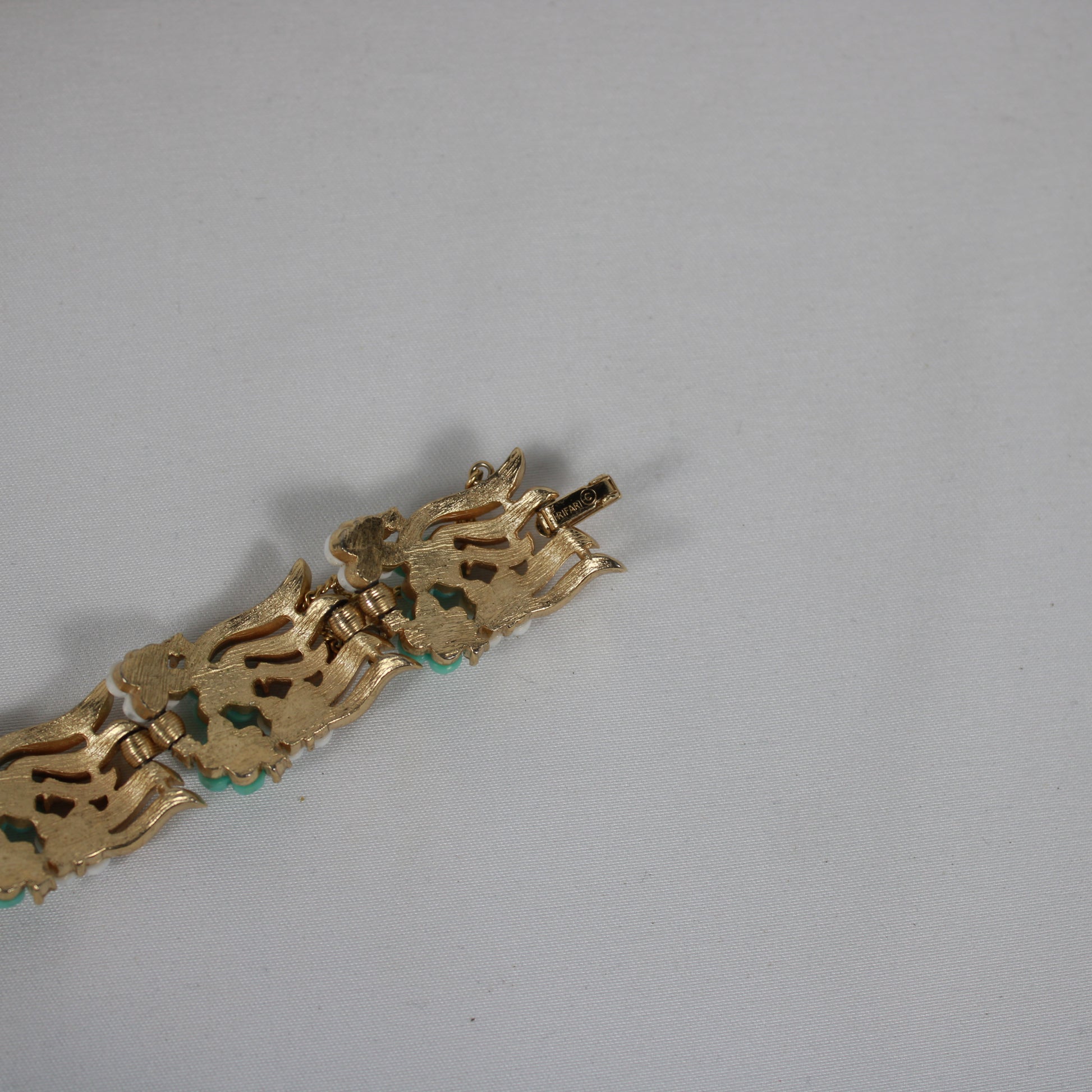 Crown Trifari Floral Demi-Parure: Gold-Tone Bracelet & Clip Earring Set