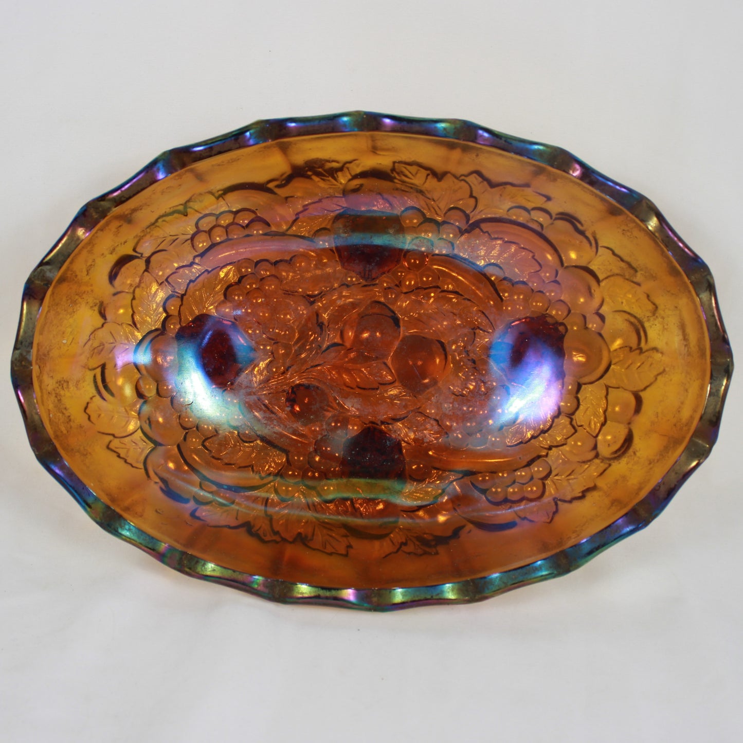 Marigold Carnival Glass Footed Oval Bowl – Heavy Embossed Fruit & Vine Pattern