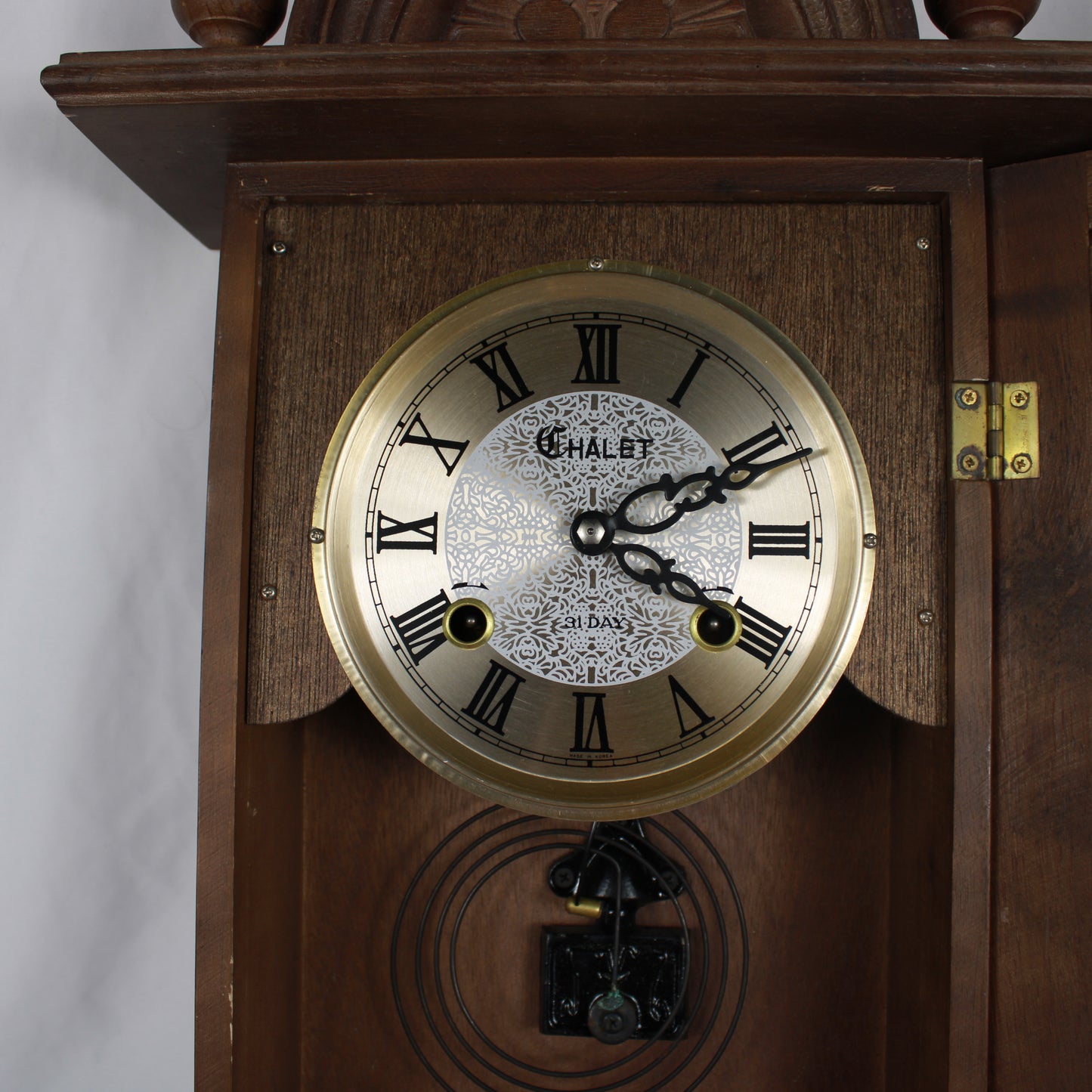 Chalet 31-Day Wooden Wall Clock, Pendulum Chime Clock with Winding Key