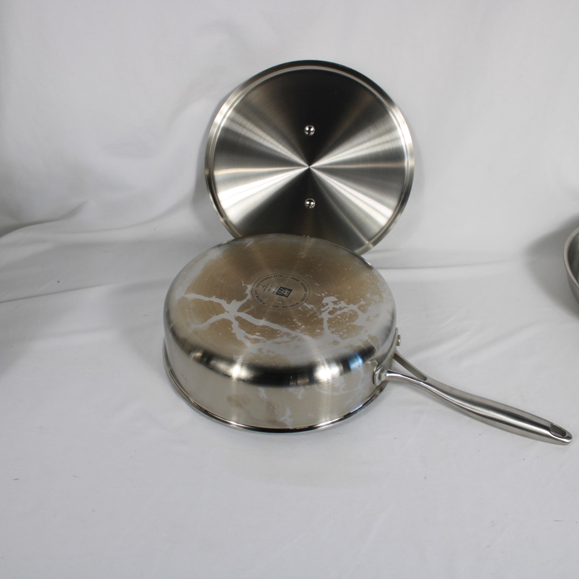 Zwilling J.A. Henckels 3-Ply Stainless Steel Cookware Set with Lids