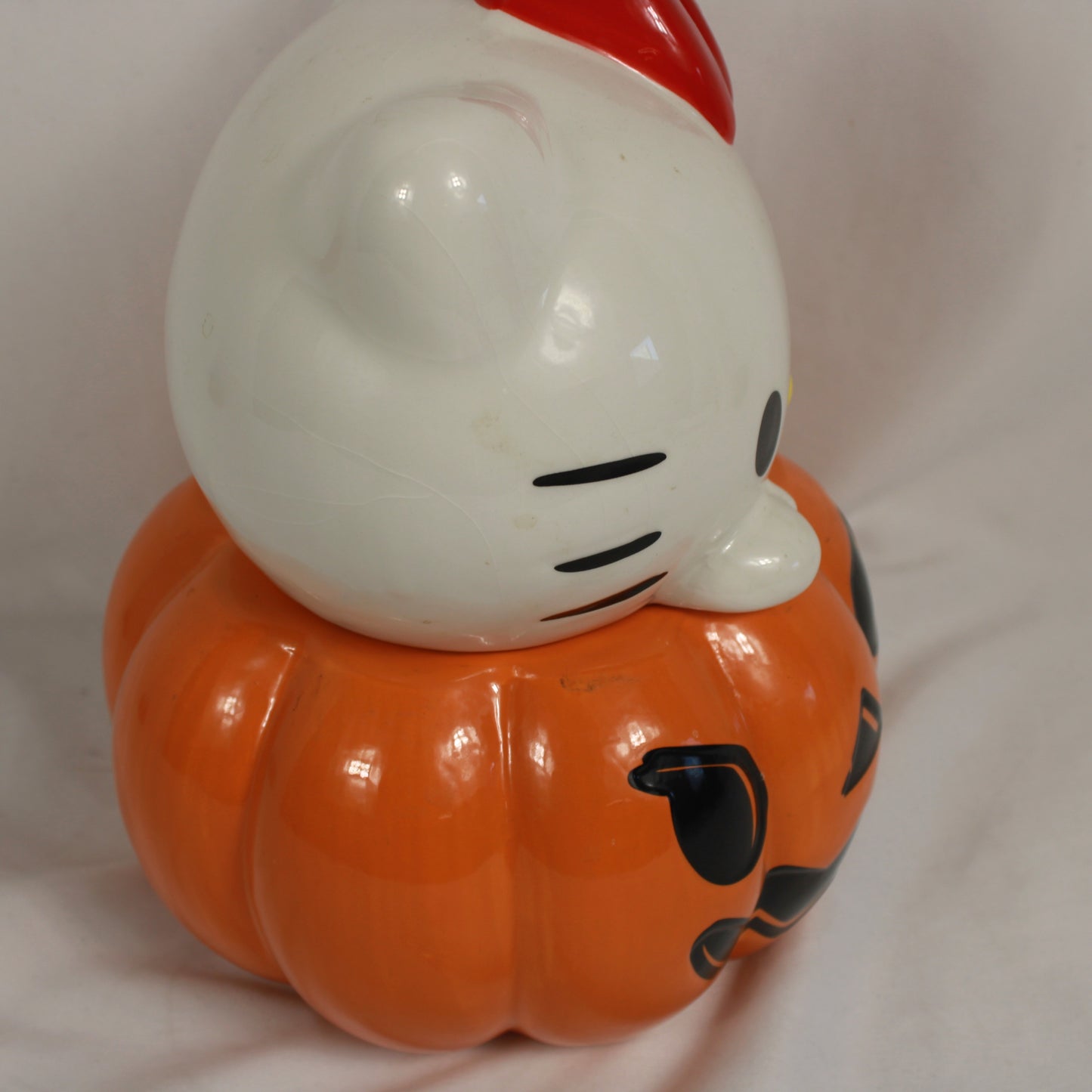 Sanrio Hello Kitty Spooky Eyeball Bow Halloween Pumpkin Ceramic Cookie Jar