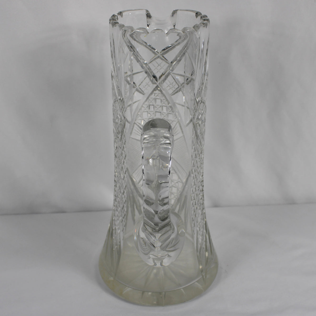 Vintage Cut Glass Water Pitcher with Pinwheel and Starburst Patterns
