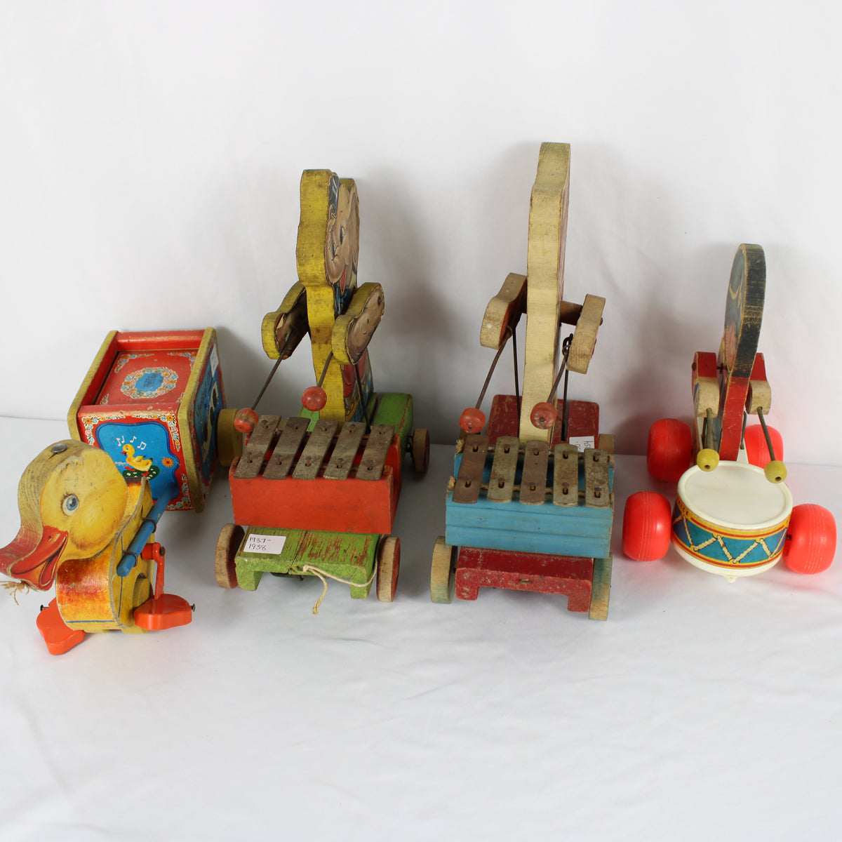 Vintage Fisher-Price Wooden Musical Pull Toy Collection (Lot of 4)