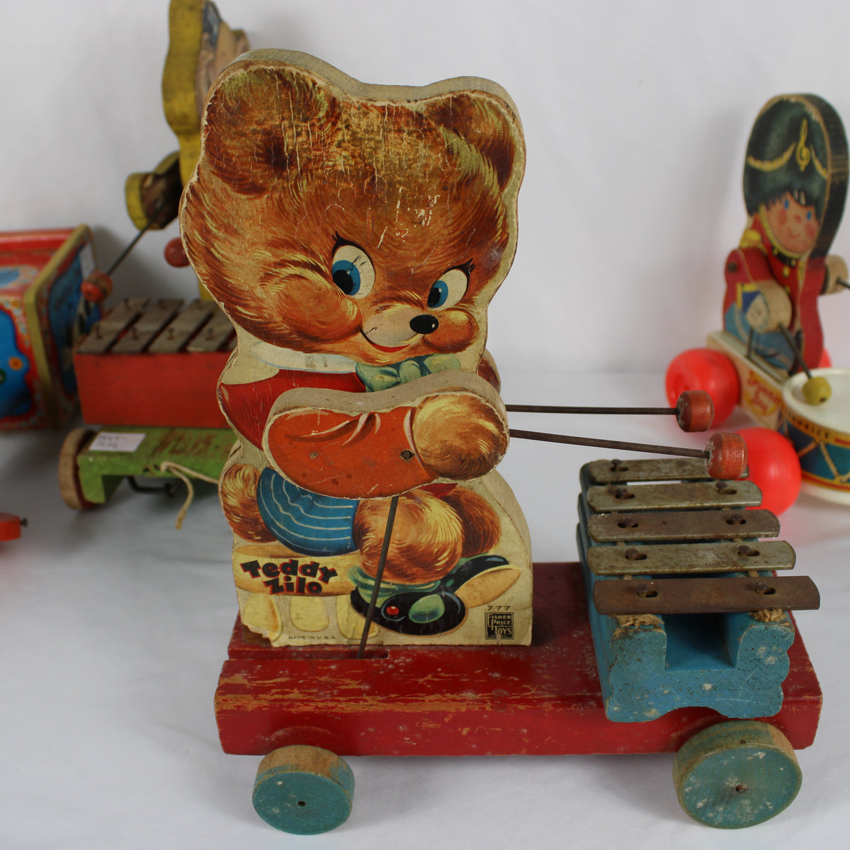 Vintage Fisher-Price Wooden Musical Pull Toy Collection (Lot of 4)