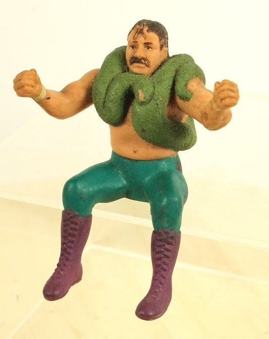 Vintage WWF Jake “The Snake” Roberts Thumb Action Figure – Classic Wrestling Collectible