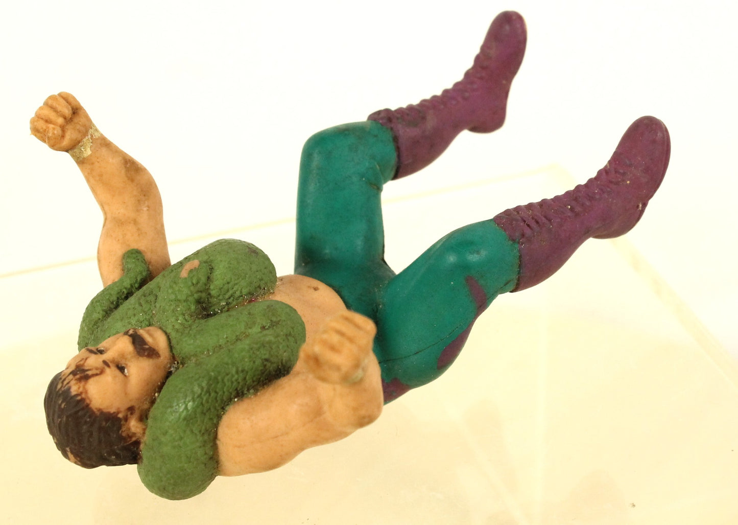 Vintage WWF Jake “The Snake” Roberts Thumb Action Figure – Classic Wrestling Collectible